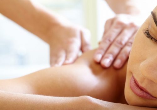 Part of face of calm female during luxurious procedure of massage